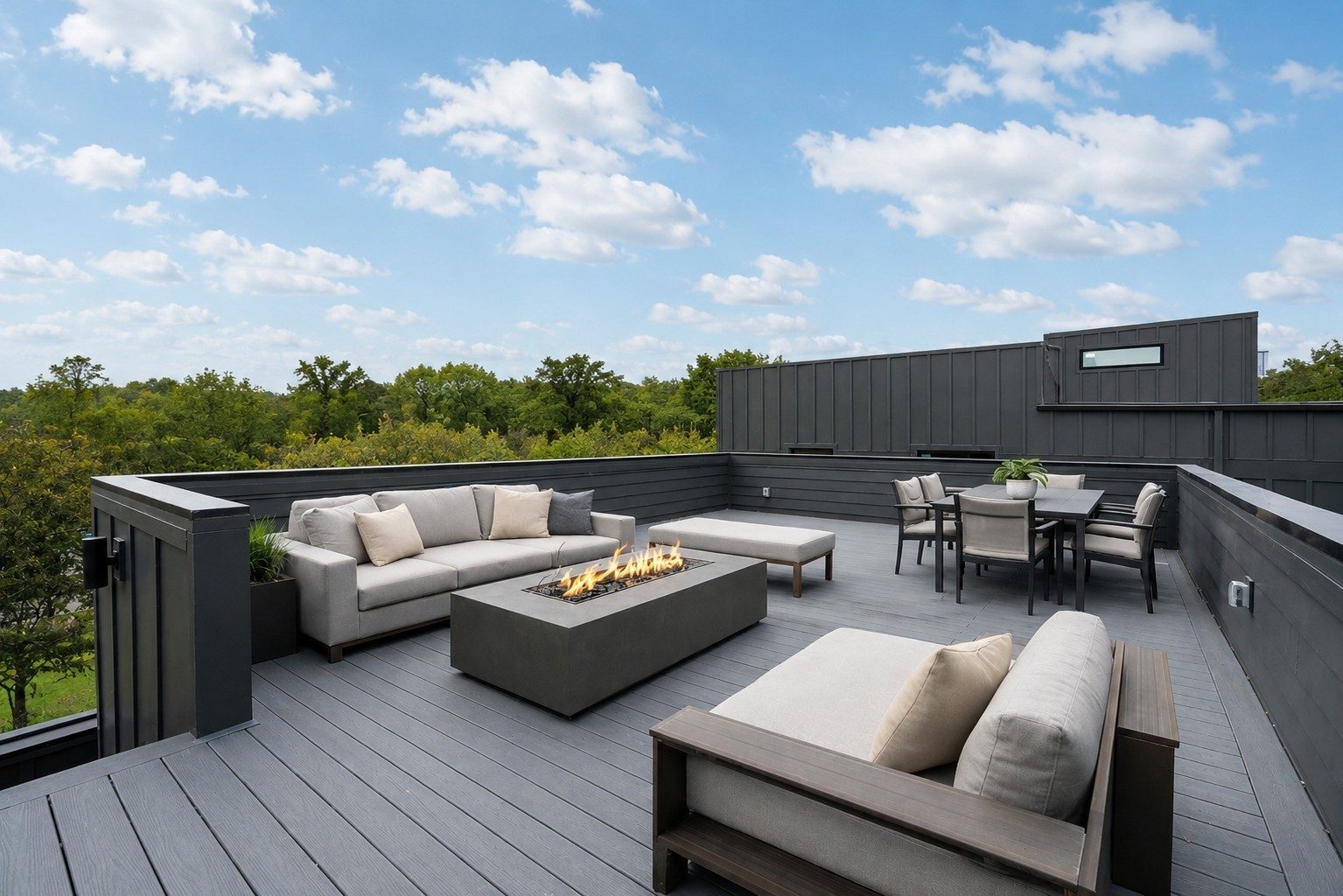 Rooftop deck with outdoor seating, a fire table, and a dining table at 1001 Glenview Drive in East Nashville