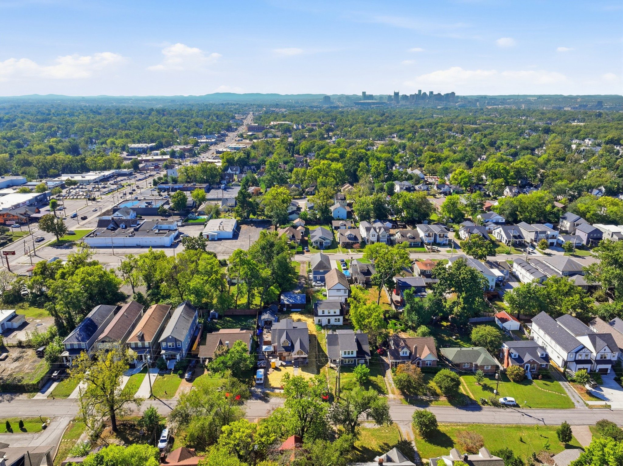 Aerial view looking toward the downtown Nashville skyline over the neighborhood around 1015 Spain Avenue in East Nashville